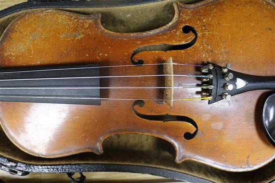 A mandolin and a cased violin